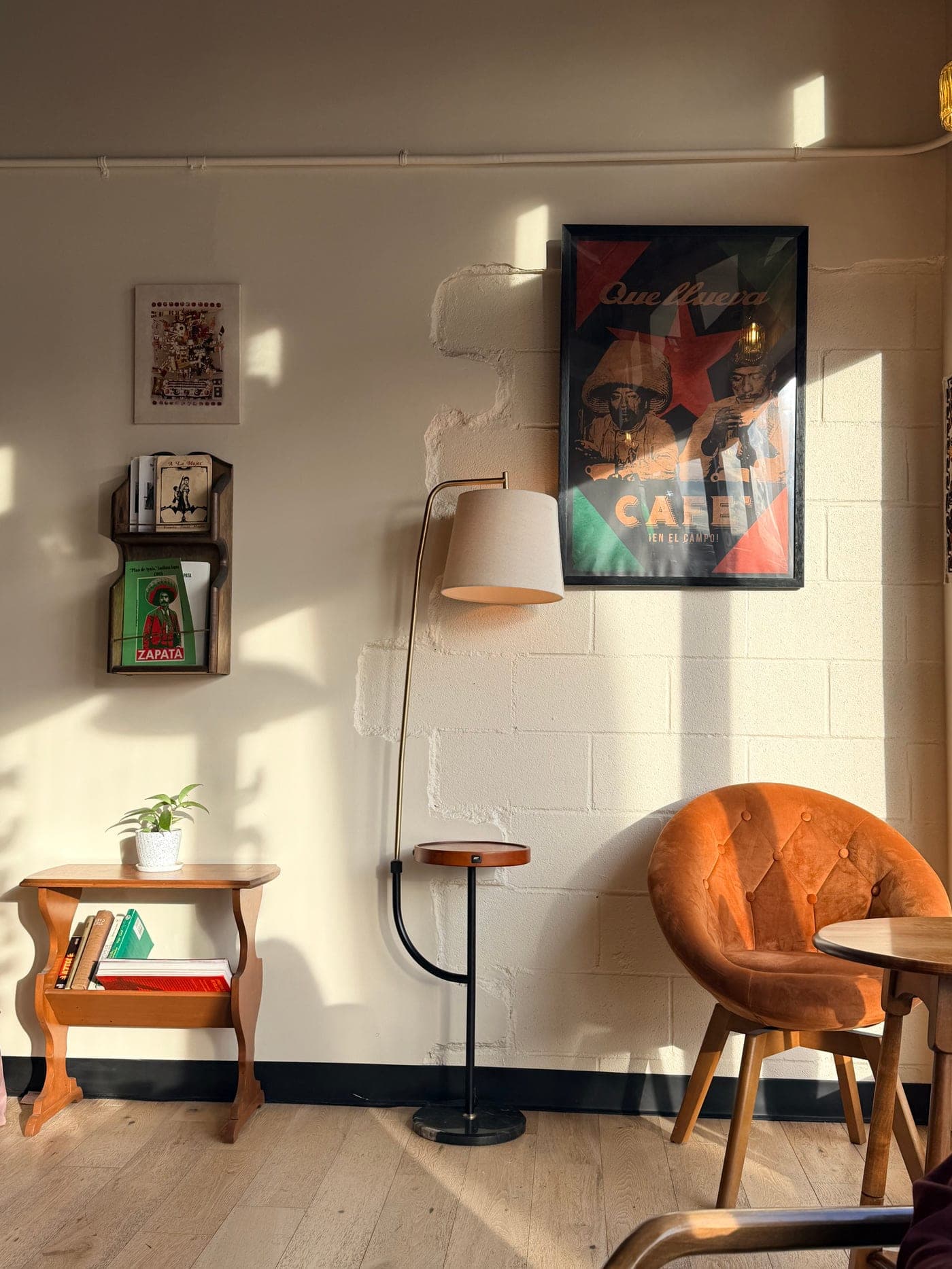 Warm, locally owned coffee shop interior — the kind of space where Sip & Share sessions take place.